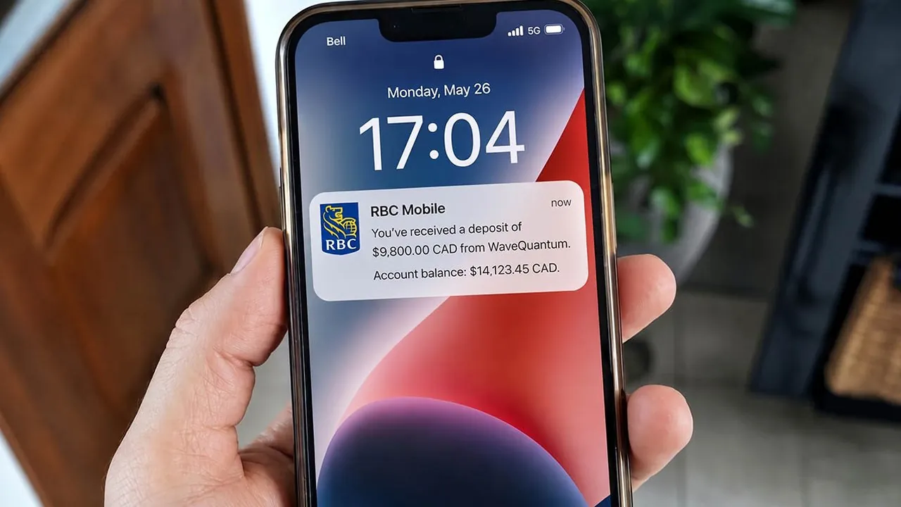 Bank notification confirming a $9,800 deposit from WaveQuantum